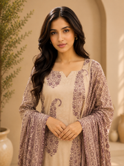 Brahmine Women's Beige Purple Cotton Printed Kurta Pant Dupatta Suit Set - Image 1